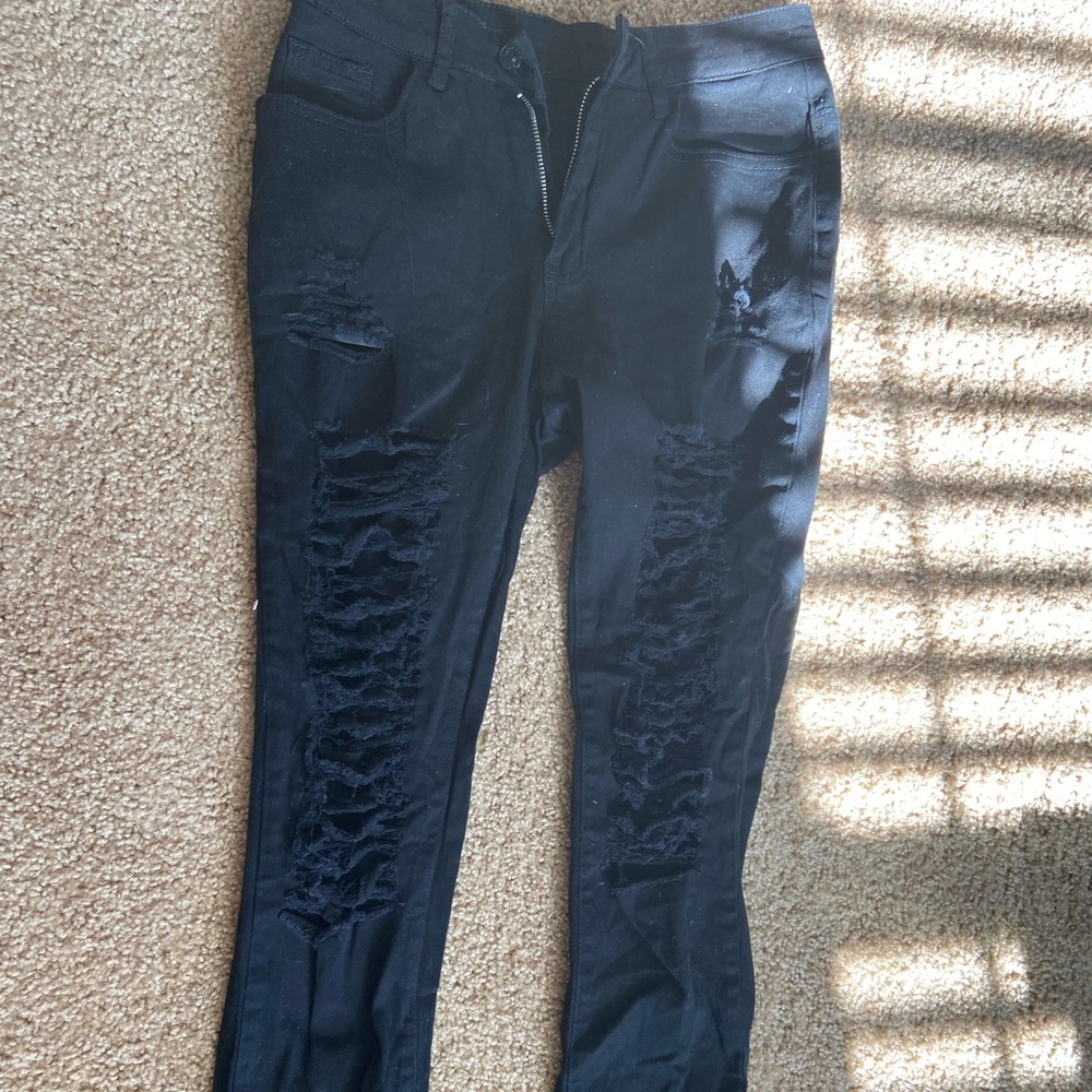 Women’s distressed jeans. Size small.